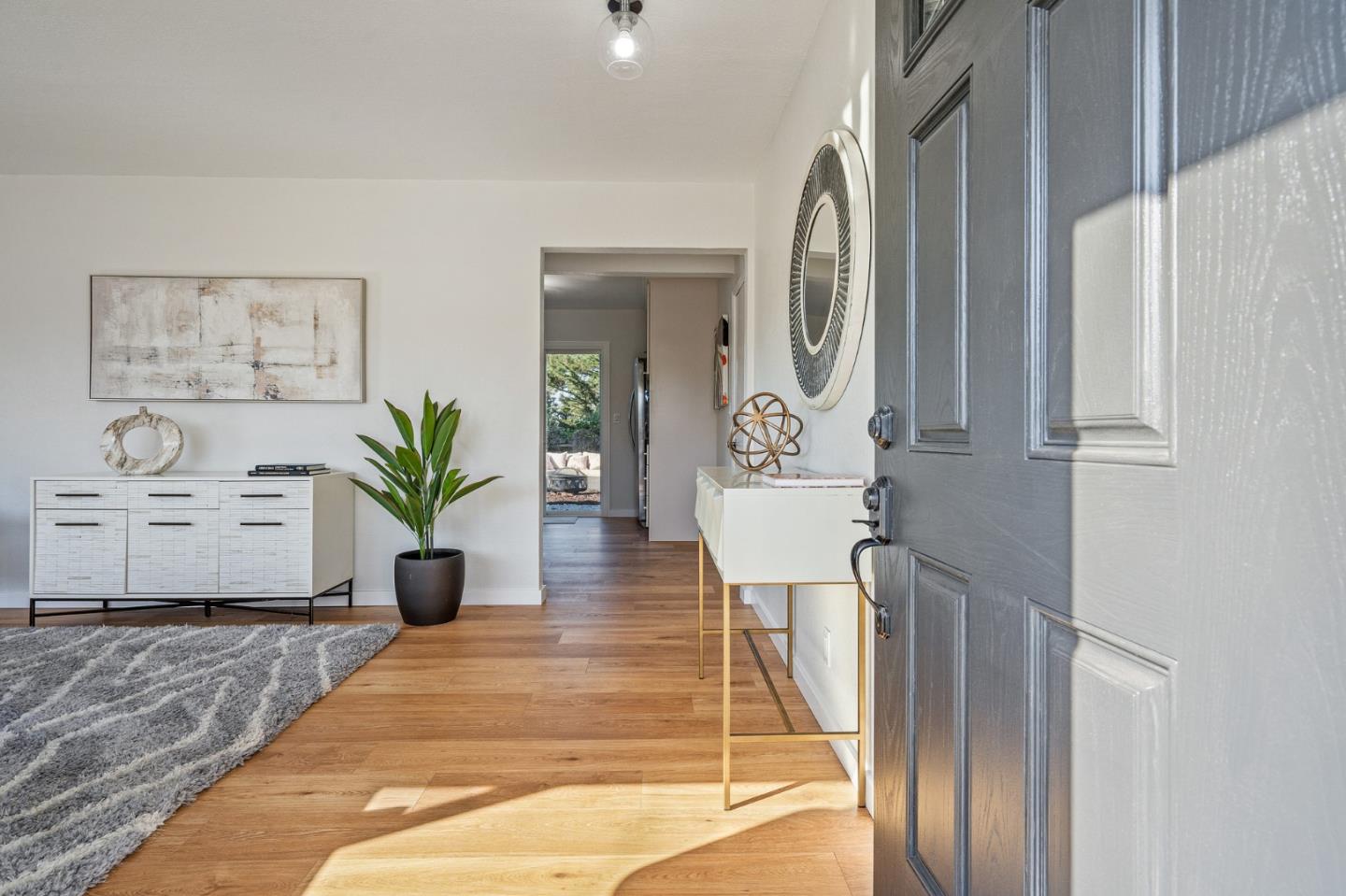 390 Heathcliff Drive Pacifica, CA 94044 - Photo 4 of 43 a view of an entryway with wooden floor