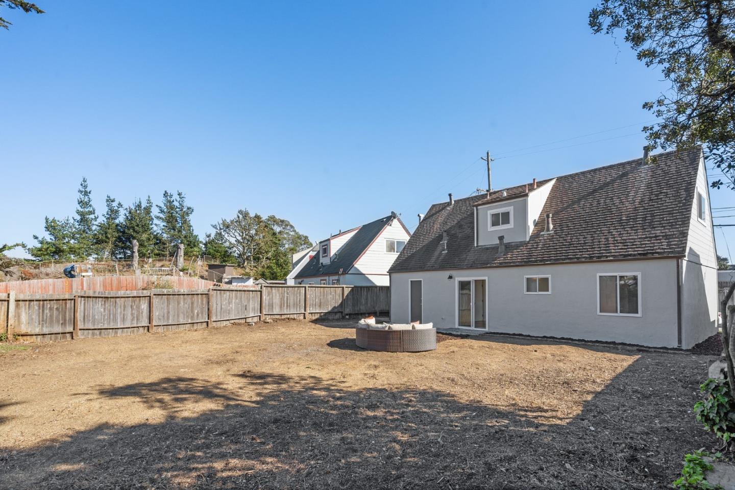 390 Heathcliff Drive Pacifica, CA 94044 - Photo 41 of 43 a front view of a house with a yard