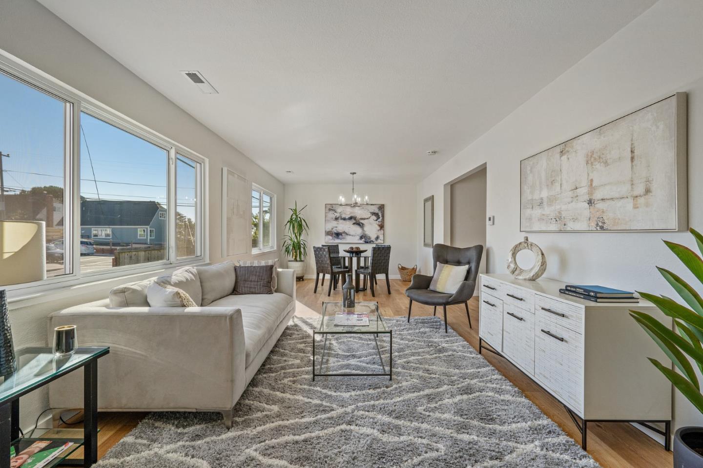 390 Heathcliff Drive Pacifica, CA 94044 - Photo 6 of 43 a living room with furniture and wooden floor