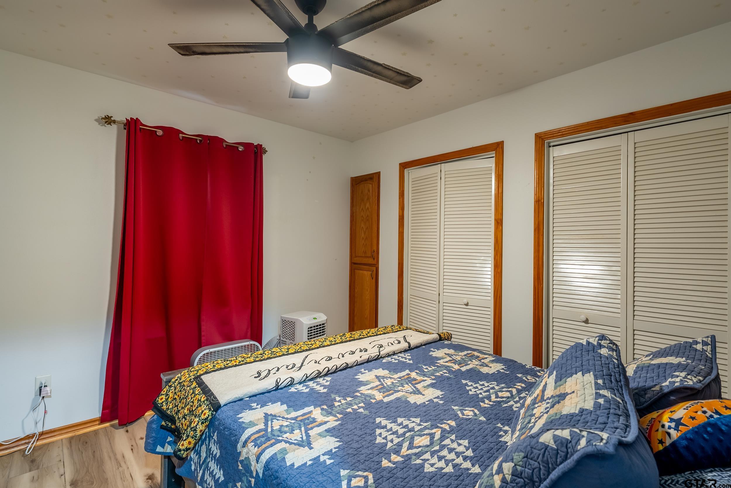 258 West 6th Street Rusk, TX 75785 - Photo 16 of 22 a bedroom with bed and window