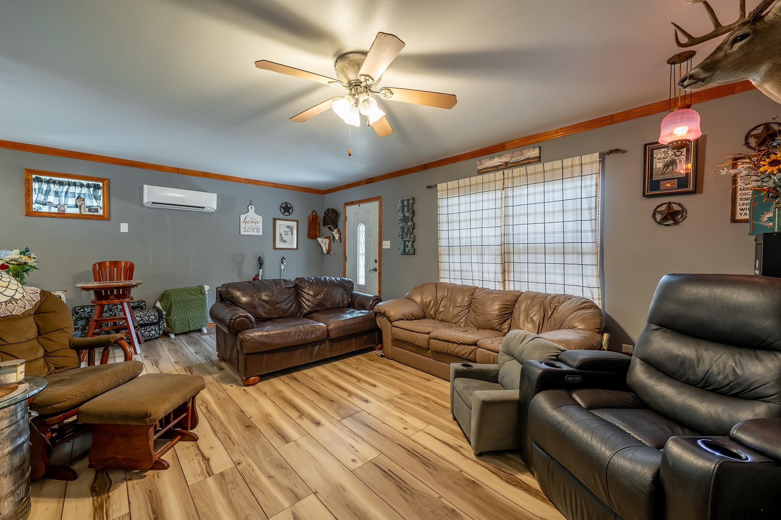258 West 6th Street Rusk, TX 75785 - Photo 18 of 22 a living room with furniture and a large window