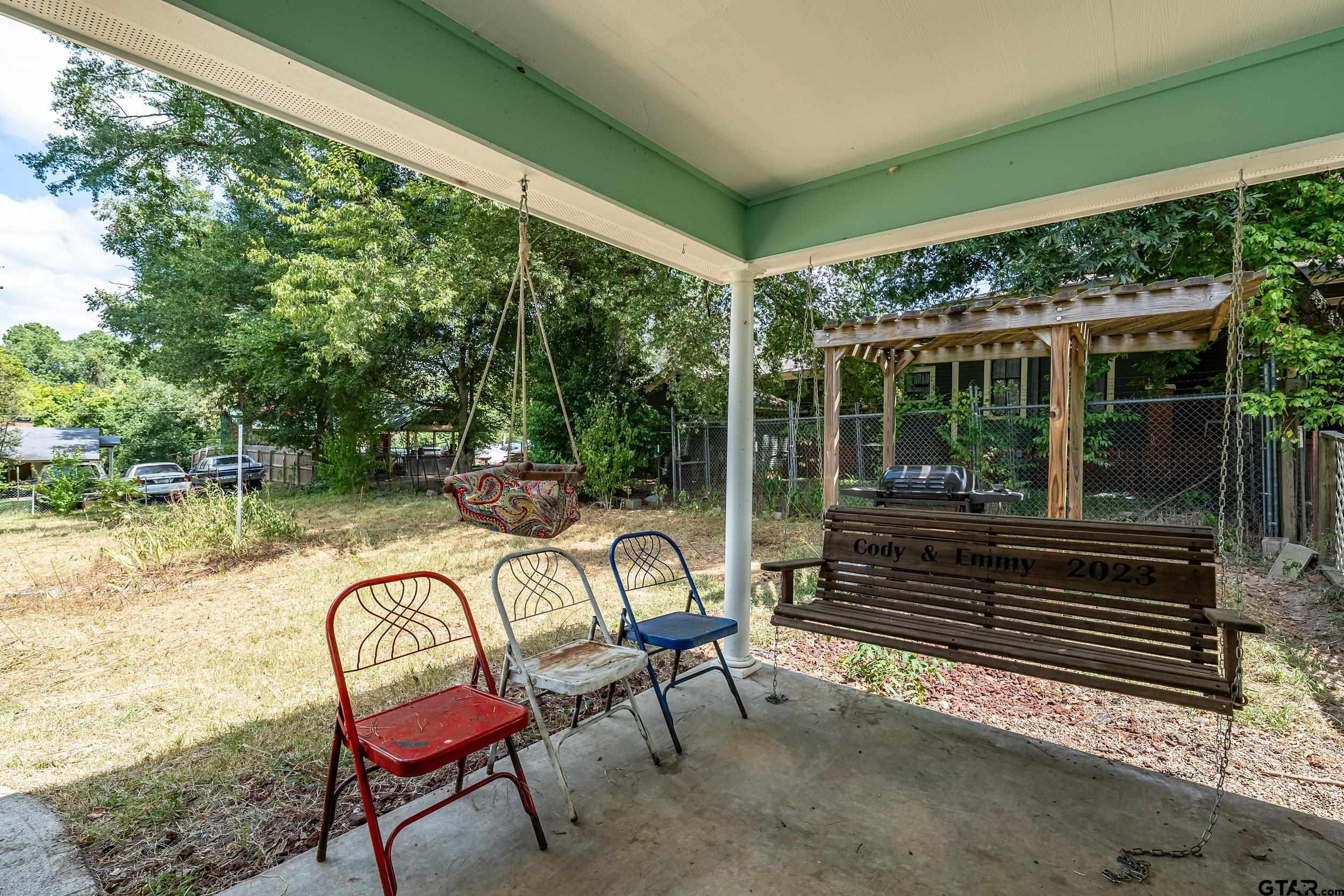 258 West 6th Street Rusk, TX 75785 - Photo 5 of 22 a outdoor view with a sitting space and large trees