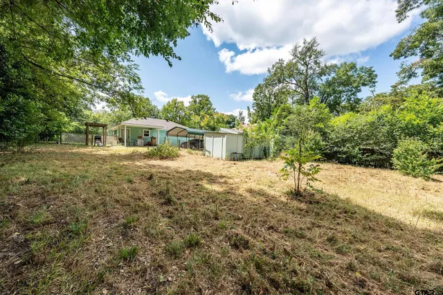 a house view with a swimming pool