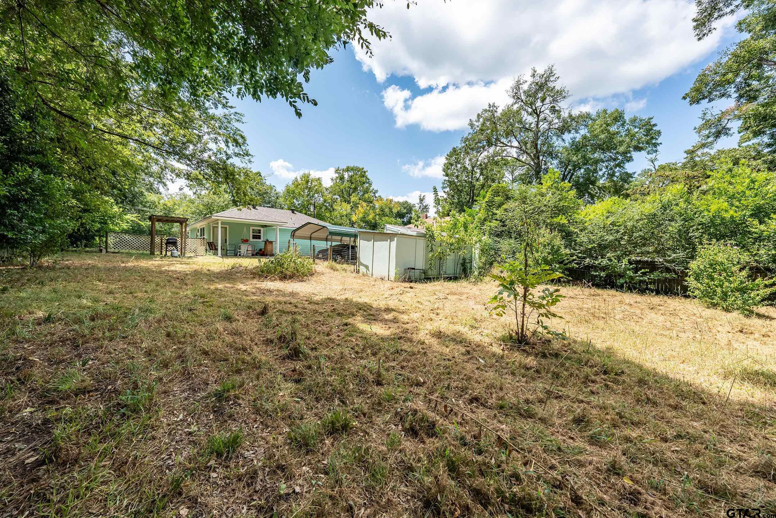 258 West 6th Street Rusk, TX 75785 - Photo 6 of 22 a house view with a swimming pool