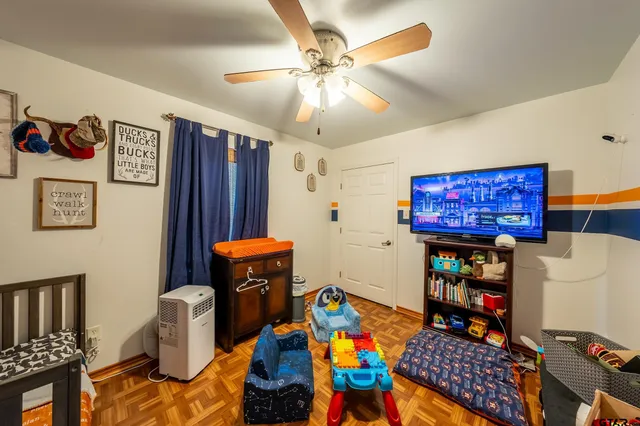 a children room with furniture and toys