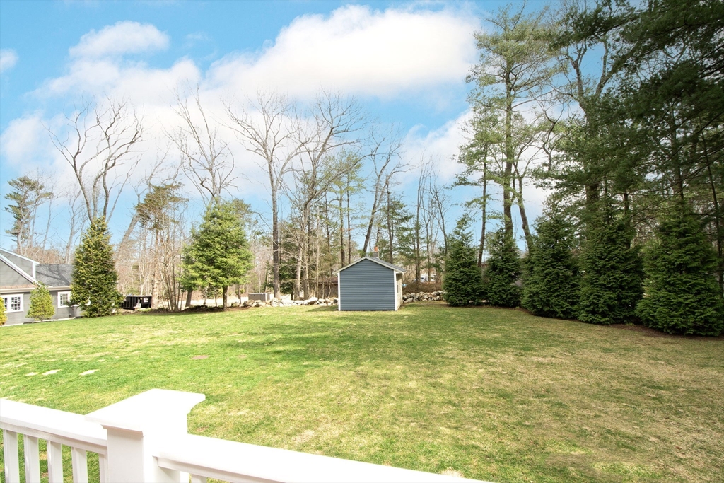 474 King Street, Unit 474 Cohasset, MA 02025 - Photo 18 of 18 a view of a field with tree in the background