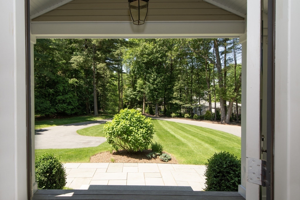 474 King Street, Unit 474 Cohasset, MA 02025 - Photo 2 of 18 a view of a backyard