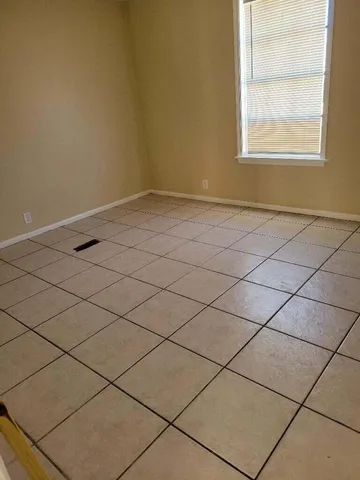 a view of a room and window