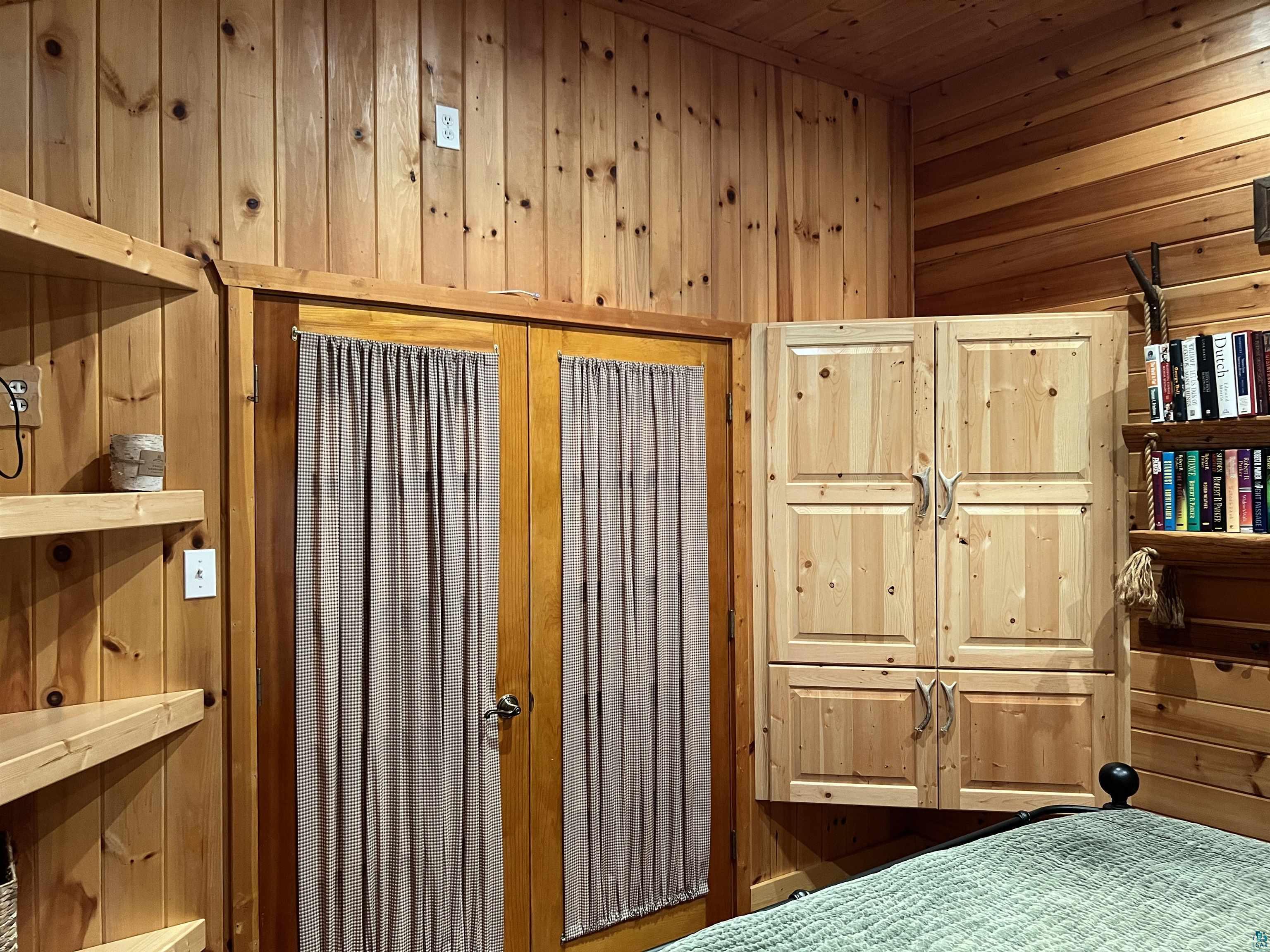 46835 Behan Drive Cable, WI 54821 - Photo 18 of 42 Bedroom with wood walls