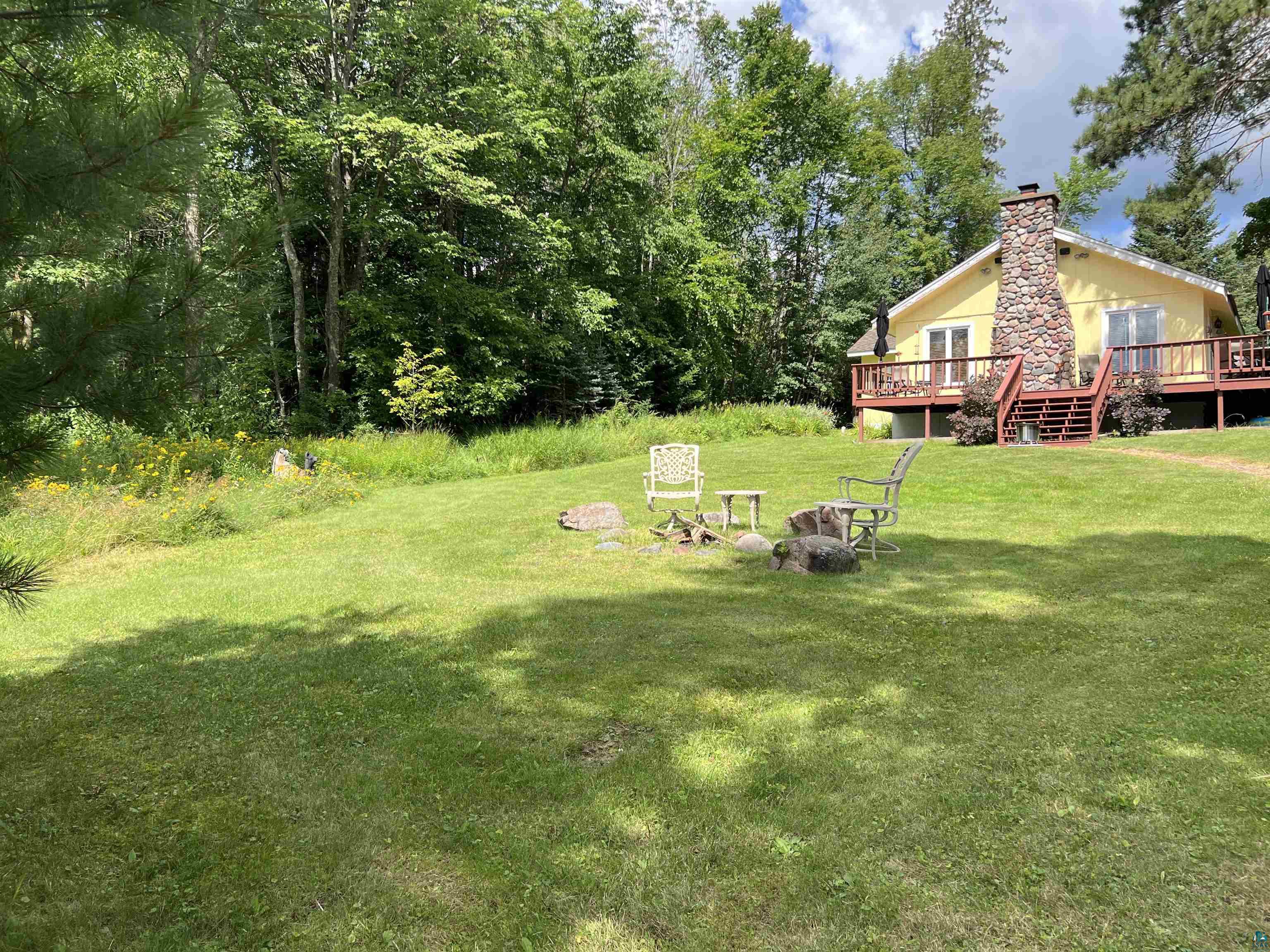 46835 Behan Drive Cable, WI 54821 - Photo 32 of 42 View of yard with a wooden deck