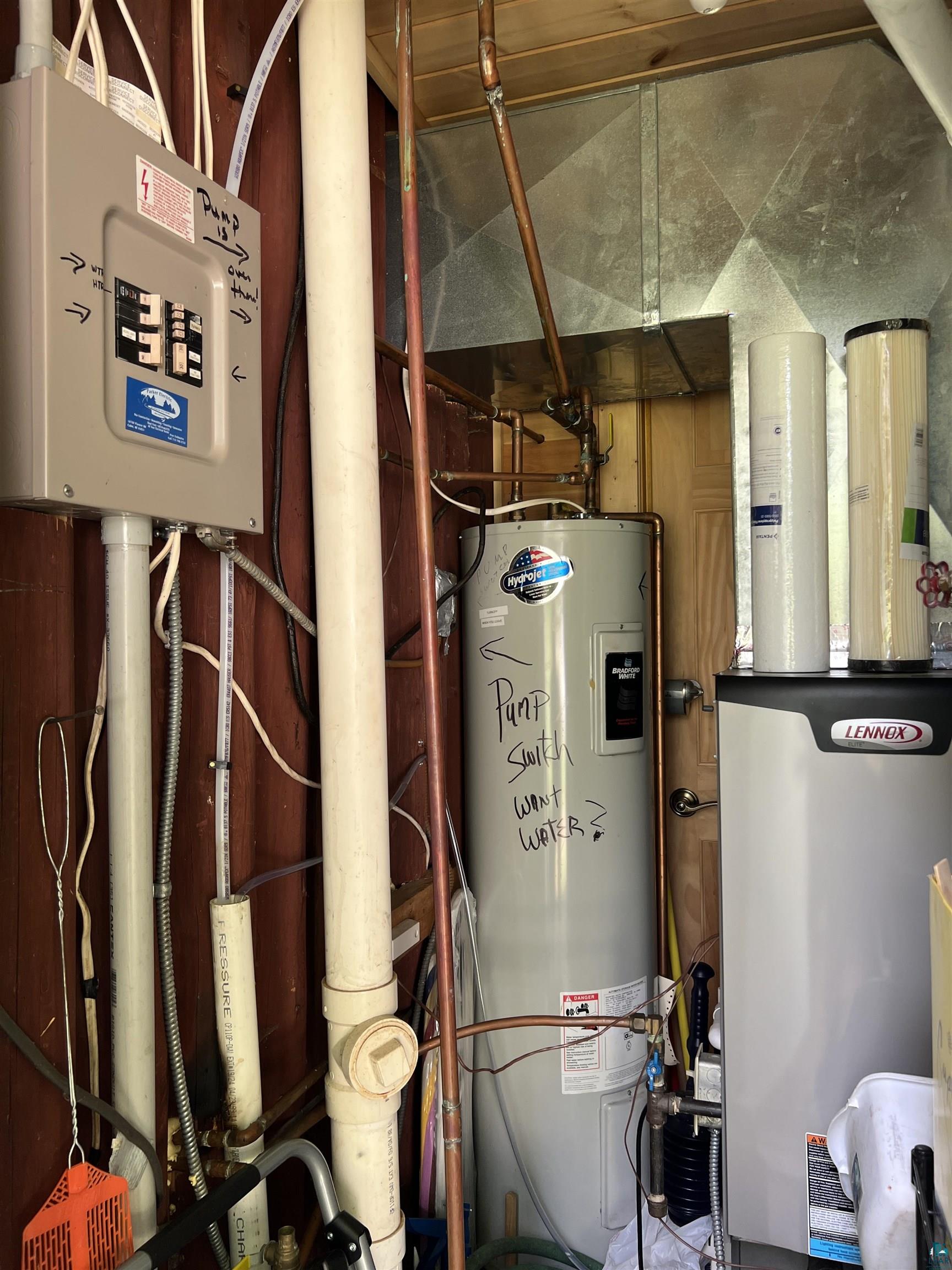 46835 Behan Drive Cable, WI 54821 - Photo 39 of 42 Utility room featuring electric water heater