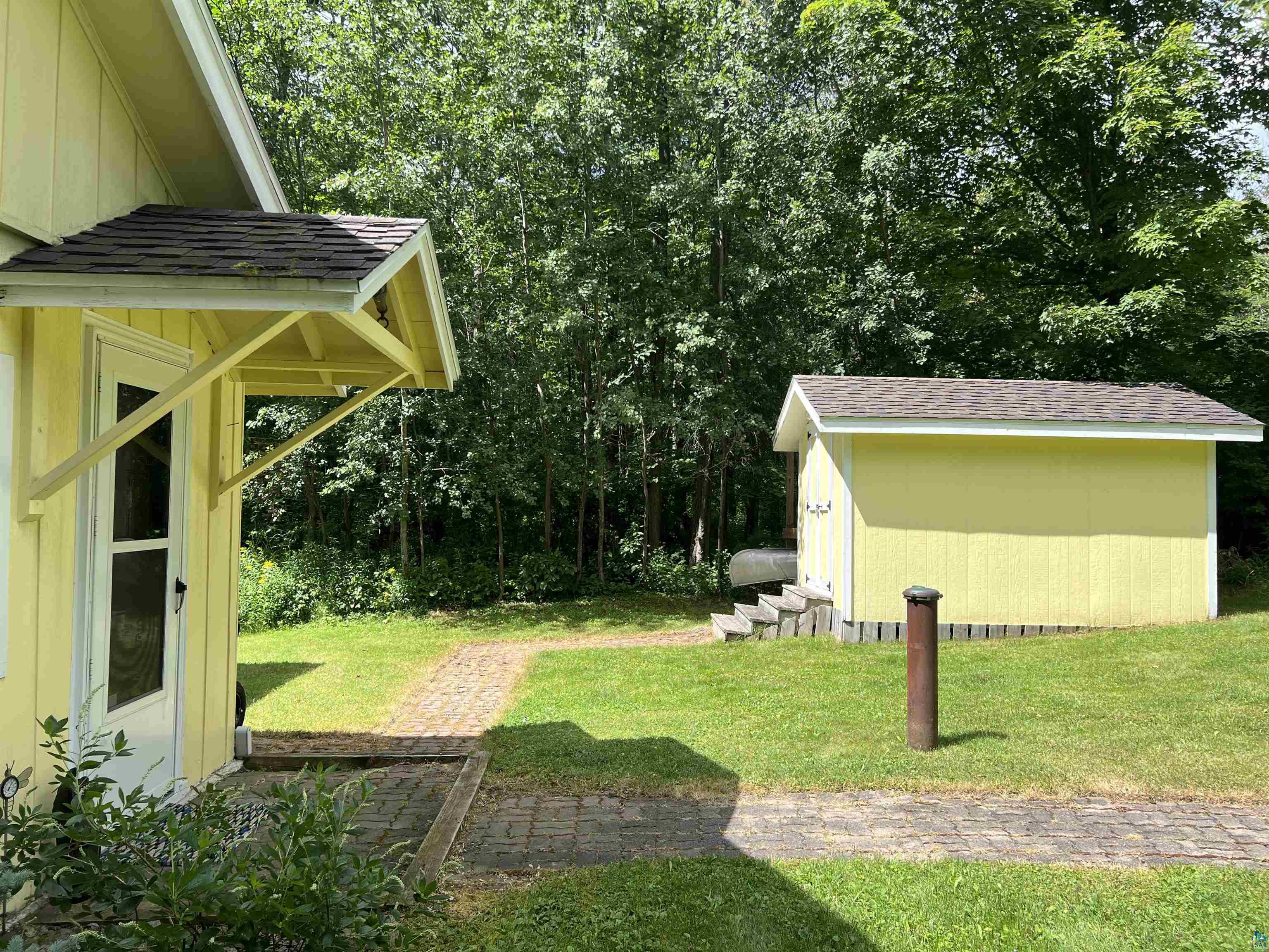 46835 Behan Drive Cable, WI 54821 - Photo 4 of 42 View of yard featuring a shed