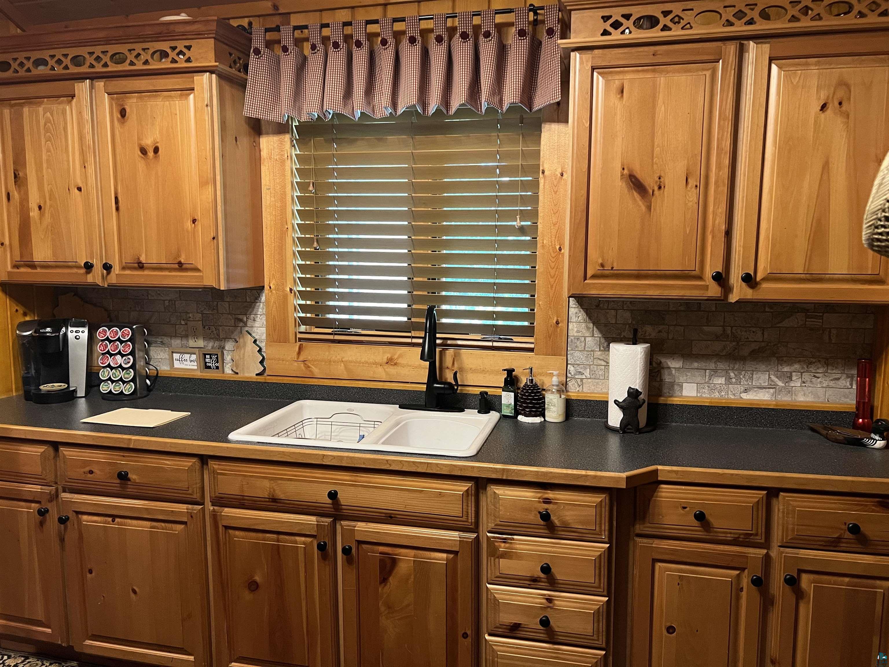 46835 Behan Drive Cable, WI 54821 - Photo 9 of 42 Kitchen with tasteful backsplash and sink