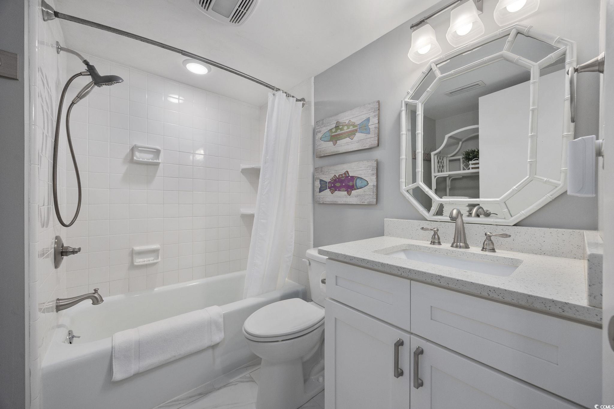 10100 Beach Club Drive, Unit 14F Myrtle Beach, SC 29572 - Photo 27 of 40 Full bathroom with shower / bathtub combination with curtain, vanity, and recessed lighting