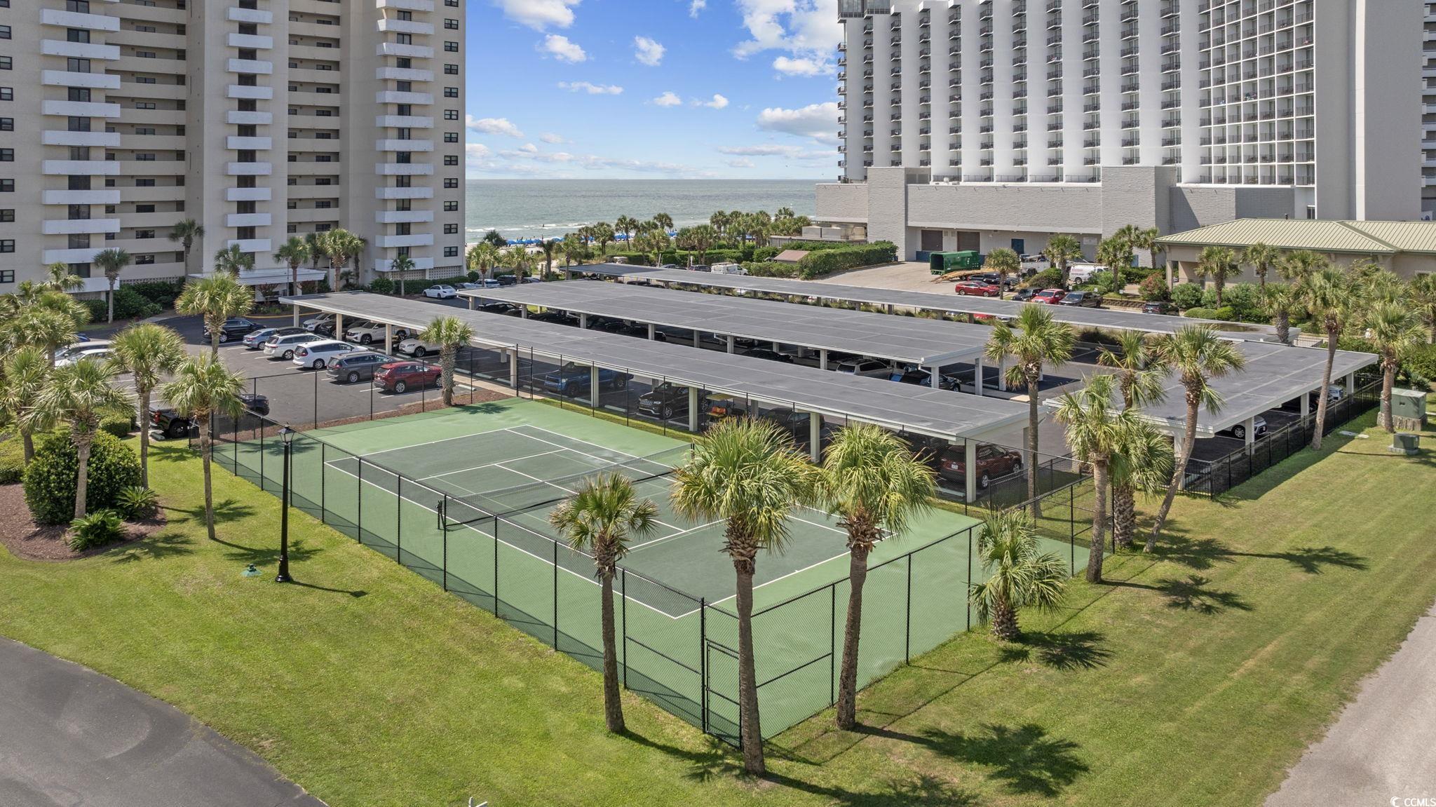 10100 Beach Club Drive, Unit 14F Myrtle Beach, SC 29572 - Photo 35 of 40 Aerial view of a large body of water and apartment complex