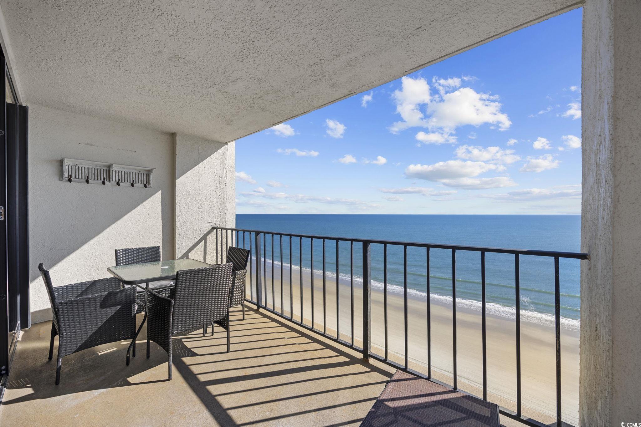 10100 Beach Club Drive, Unit 14F Myrtle Beach, SC 29572 - Photo 9 of 40 Balcony with view of water and beach