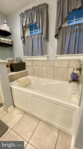 a bathroom with a bathtub