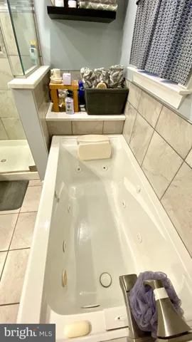 a picture of a couch in a kitchen