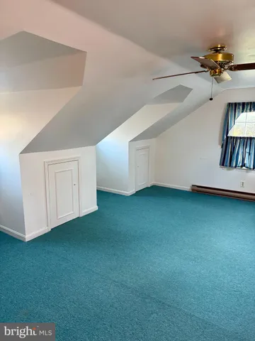 a view of a room with a workspace