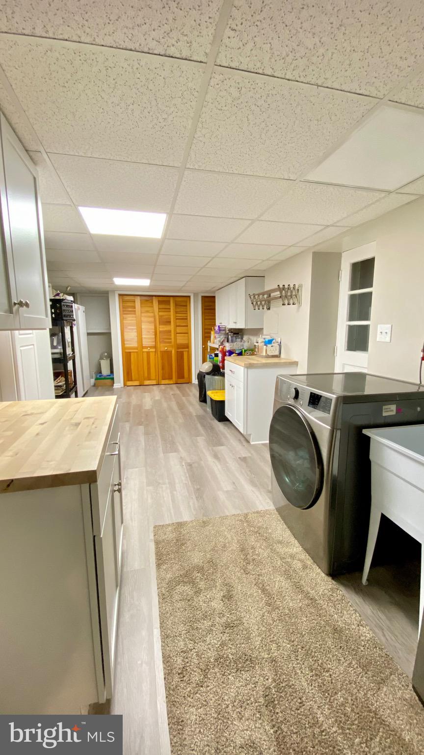13904 Blenheim Road North Phoenix, MD 21131 - Photo 32 of 37 a kitchen with a sink a counter space and appliances