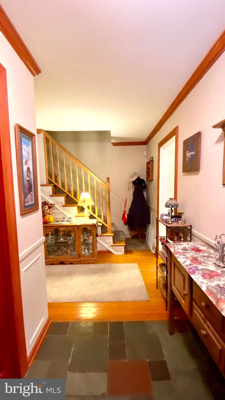13904 Blenheim Road North Phoenix, MD 21131 - Photo 35 of 37 a kitchen with stainless steel appliances granite countertop a stove and a refrigerator