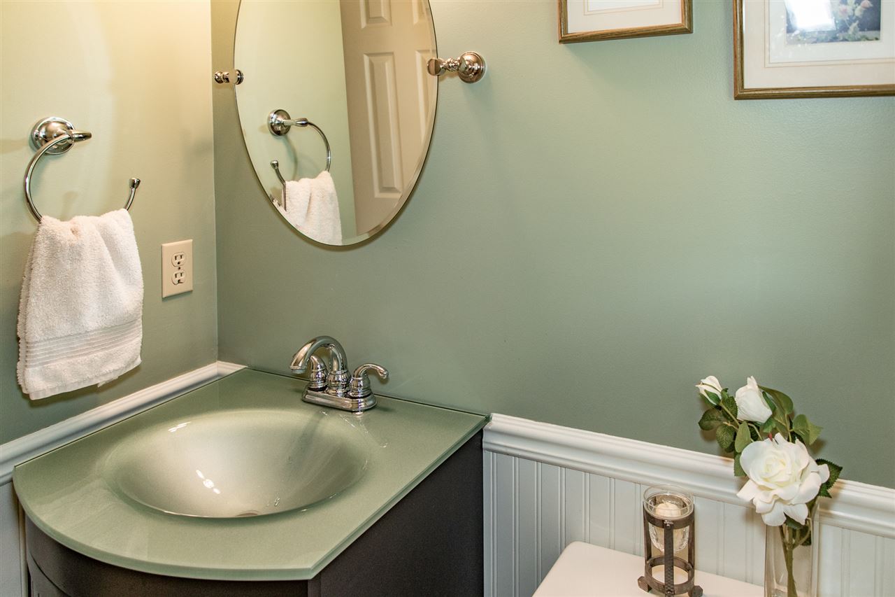 14 Thacker Mill Road Verona, VA 24482 - Photo 20 of 47 a bathroom with a sink mirror and toilet