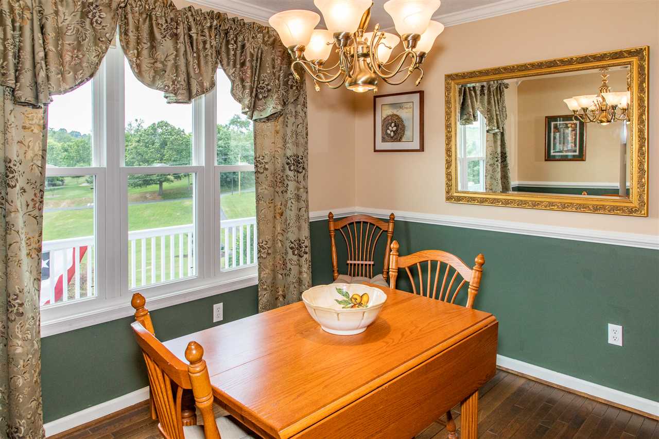 14 Thacker Mill Road Verona, VA 24482 - Photo 23 of 47 a view of a dining room with furniture window and outside view