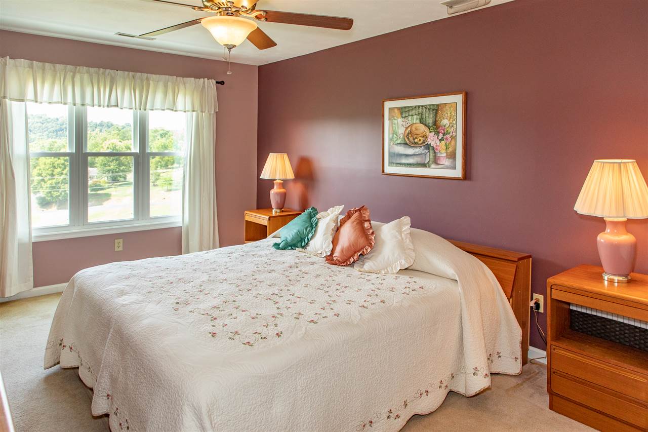 14 Thacker Mill Road Verona, VA 24482 - Photo 24 of 47 a bedroom with a bed and a window