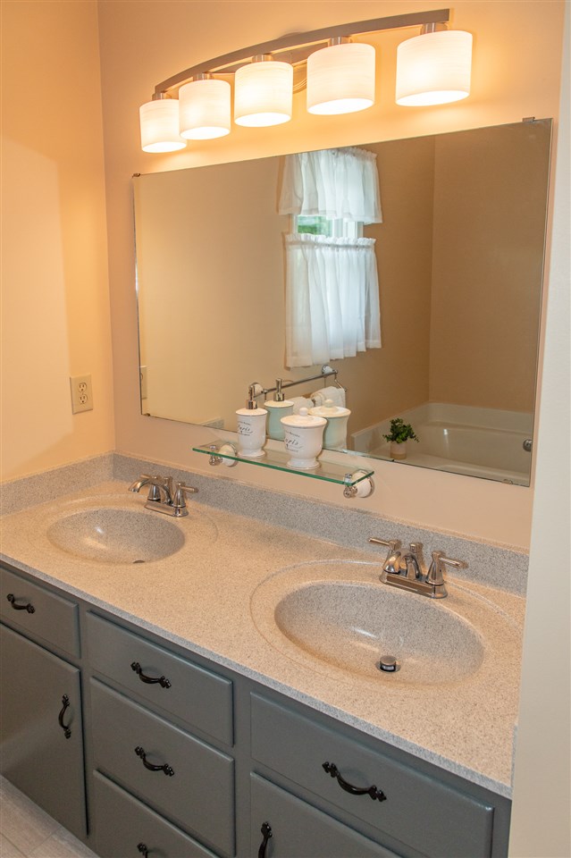 14 Thacker Mill Road Verona, VA 24482 - Photo 26 of 47 a bathroom with a sink and a mirror