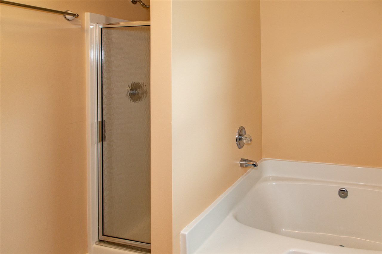 14 Thacker Mill Road Verona, VA 24482 - Photo 27 of 47 a bathroom with a tub