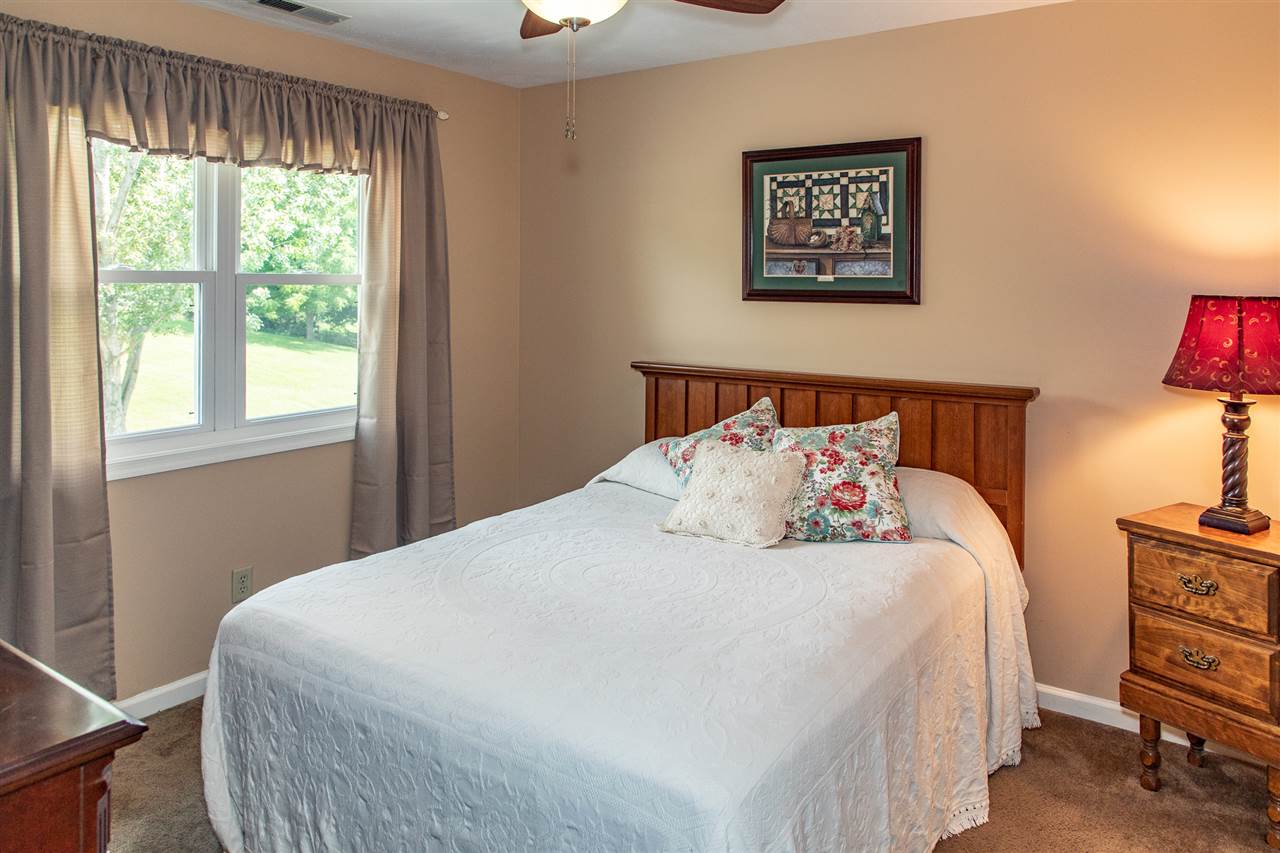 14 Thacker Mill Road Verona, VA 24482 - Photo 29 of 47 a bedroom with a bed and a window