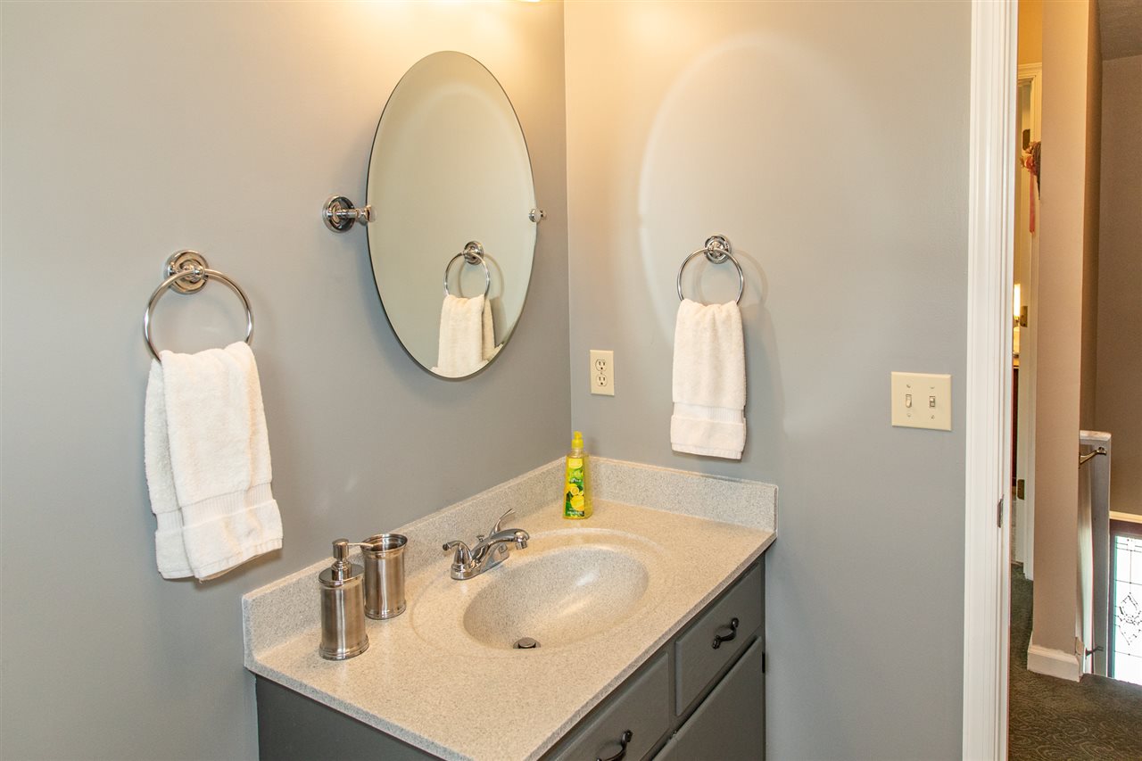 14 Thacker Mill Road Verona, VA 24482 - Photo 33 of 47 a bathroom with a sink vanity and a mirror