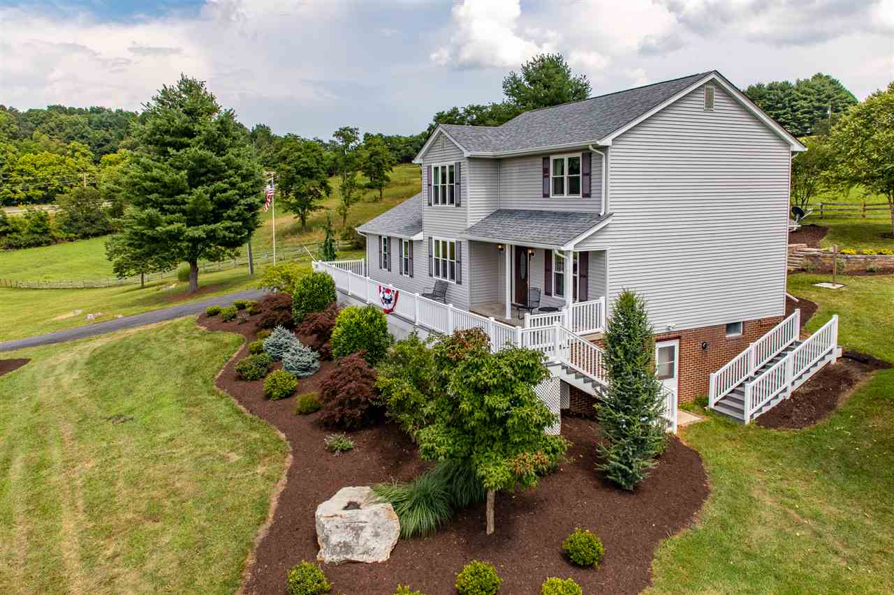 14 Thacker Mill Road Verona, VA 24482 - Photo 42 of 47 a aerial view of a house with swimming pool next to a yard