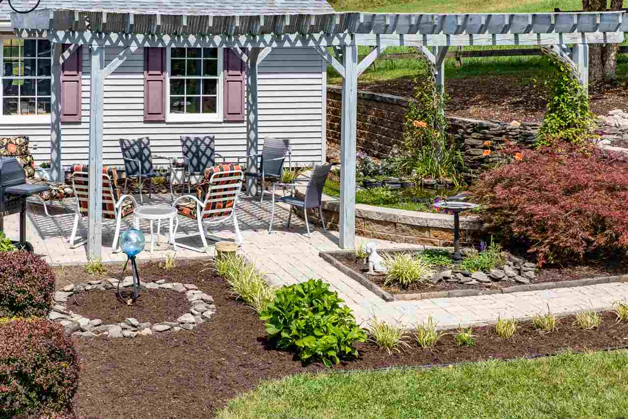 14 Thacker Mill Road Verona, VA 24482 - Photo 5 of 47 a view of a chair and table in backyard