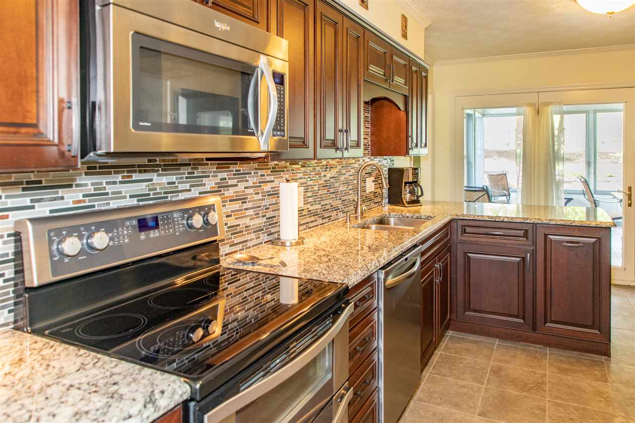 14 Thacker Mill Road Verona, VA 24482 - Photo 8 of 47 a kitchen with a stove and a sink