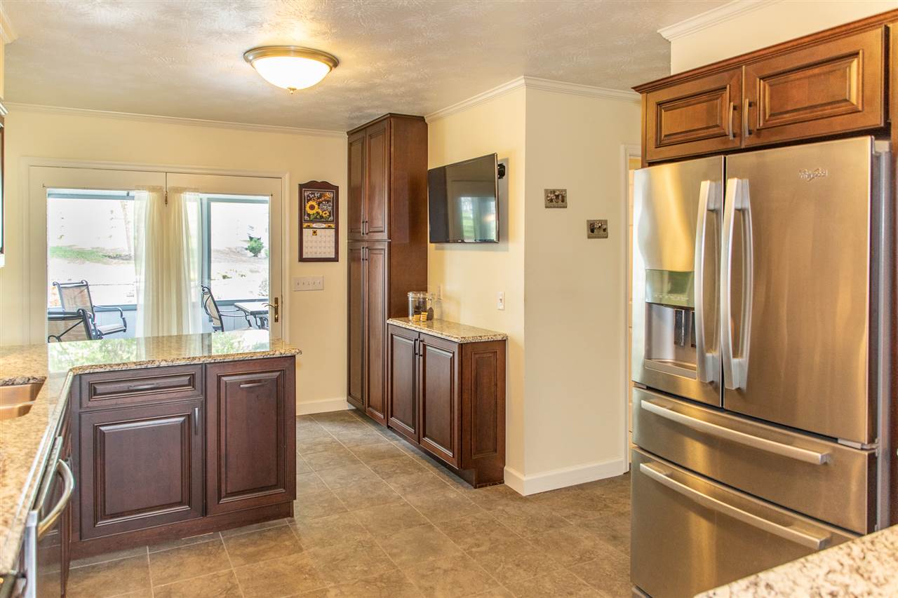 14 Thacker Mill Road Verona, VA 24482 - Photo 9 of 47 a kitchen with stainless steel appliances granite countertop a refrigerator and a stove