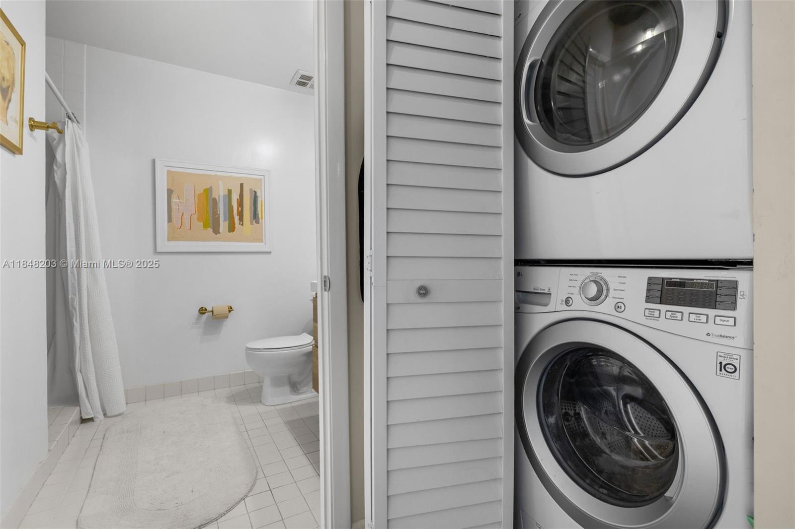 10 Southwest South River Drive, Unit 1614 Miami, FL 33130 - Photo 15 of 21 a bathroom with a toilet and a sink