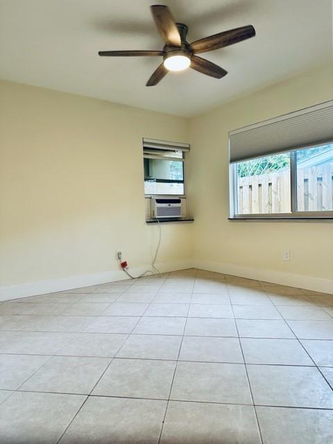 1800 Northeast 4th Street Pompano Beach, FL 33060 - Photo 7 of 8 a view of an empty room with a window