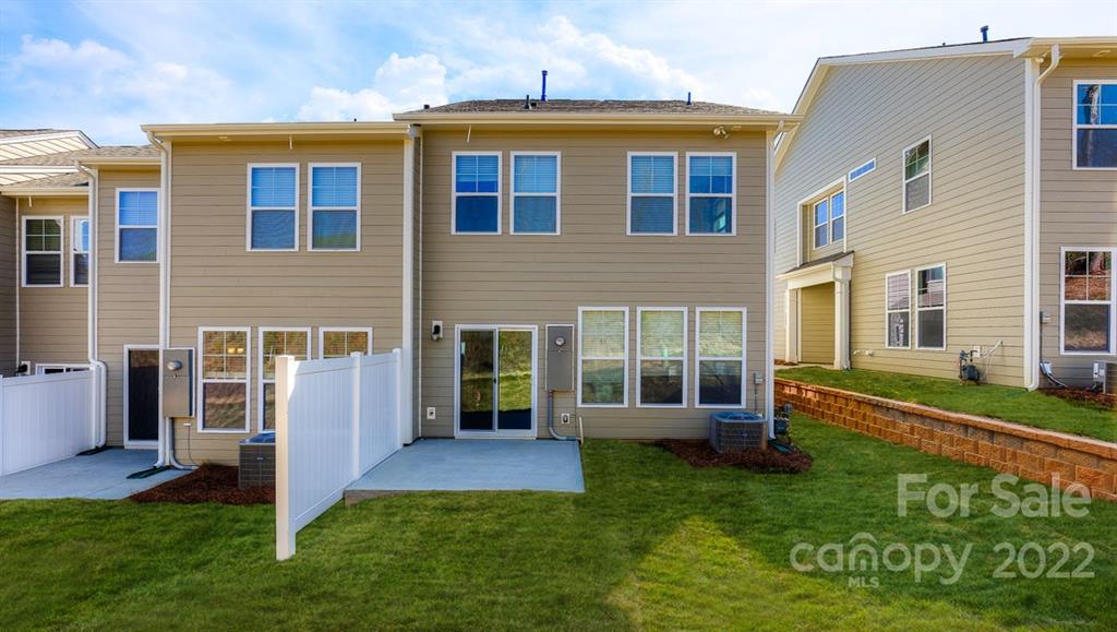 131 Creekview Road Hendersonville, NC 28792 - Photo 29 of 30 a view of a house with a yard
