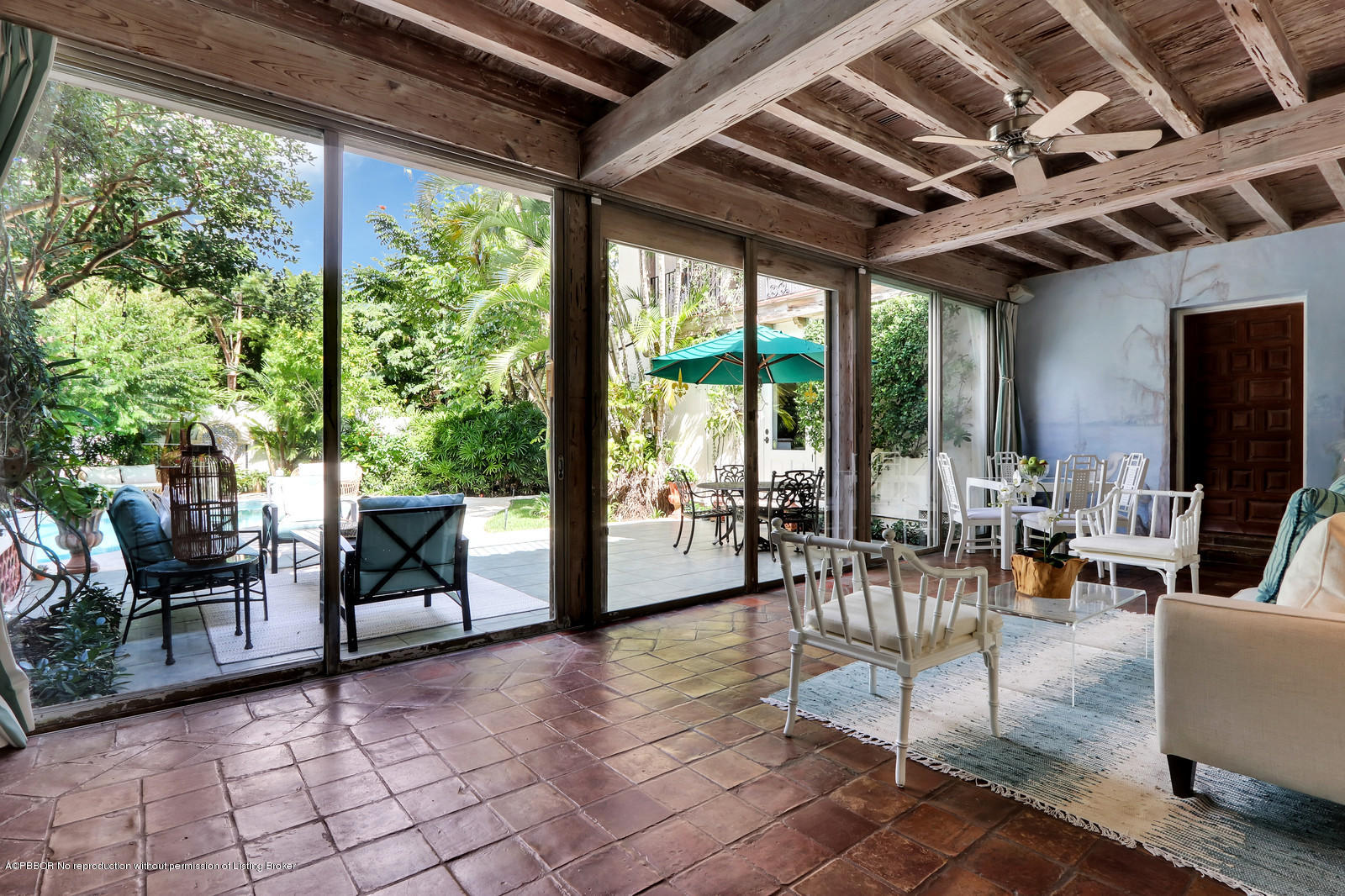 271 El Vedado Road Palm Beach, FL 33480 - Photo 19 of 32 a living room with furniture and a flat screen tv