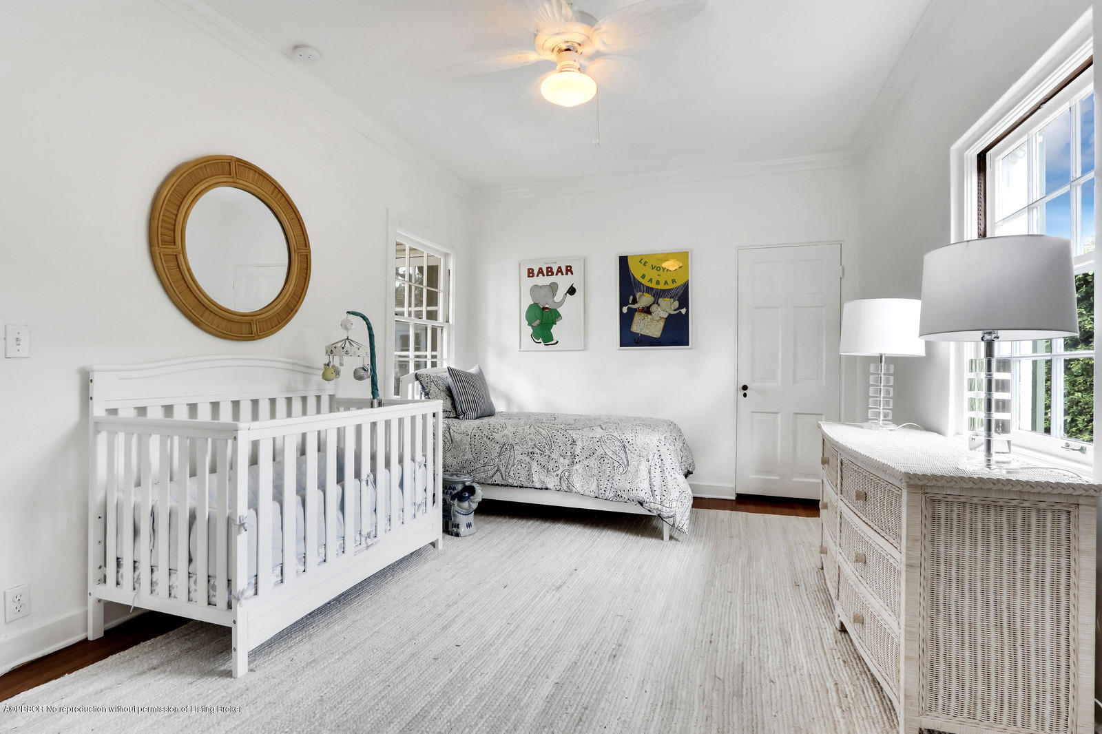 271 El Vedado Road Palm Beach, FL 33480 - Photo 24 of 32 a bedroom with a bed a mirror on dresser and a window