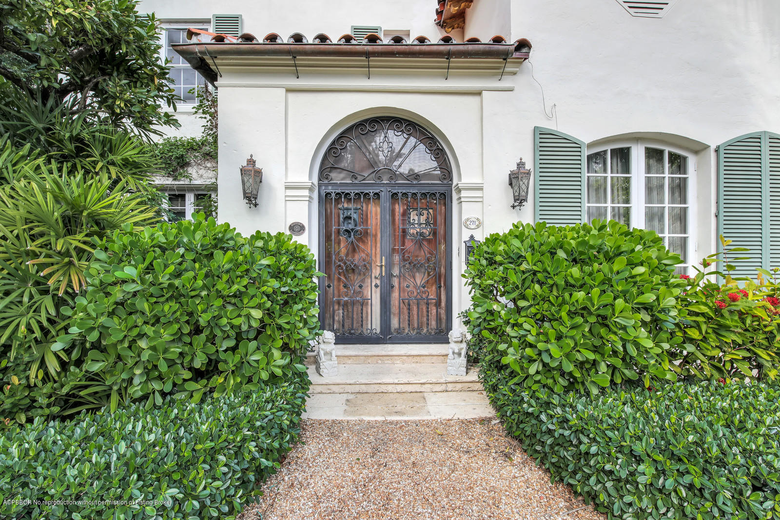 271 El Vedado Road Palm Beach, FL 33480 - Photo 4 of 32 a front view of a house with garden