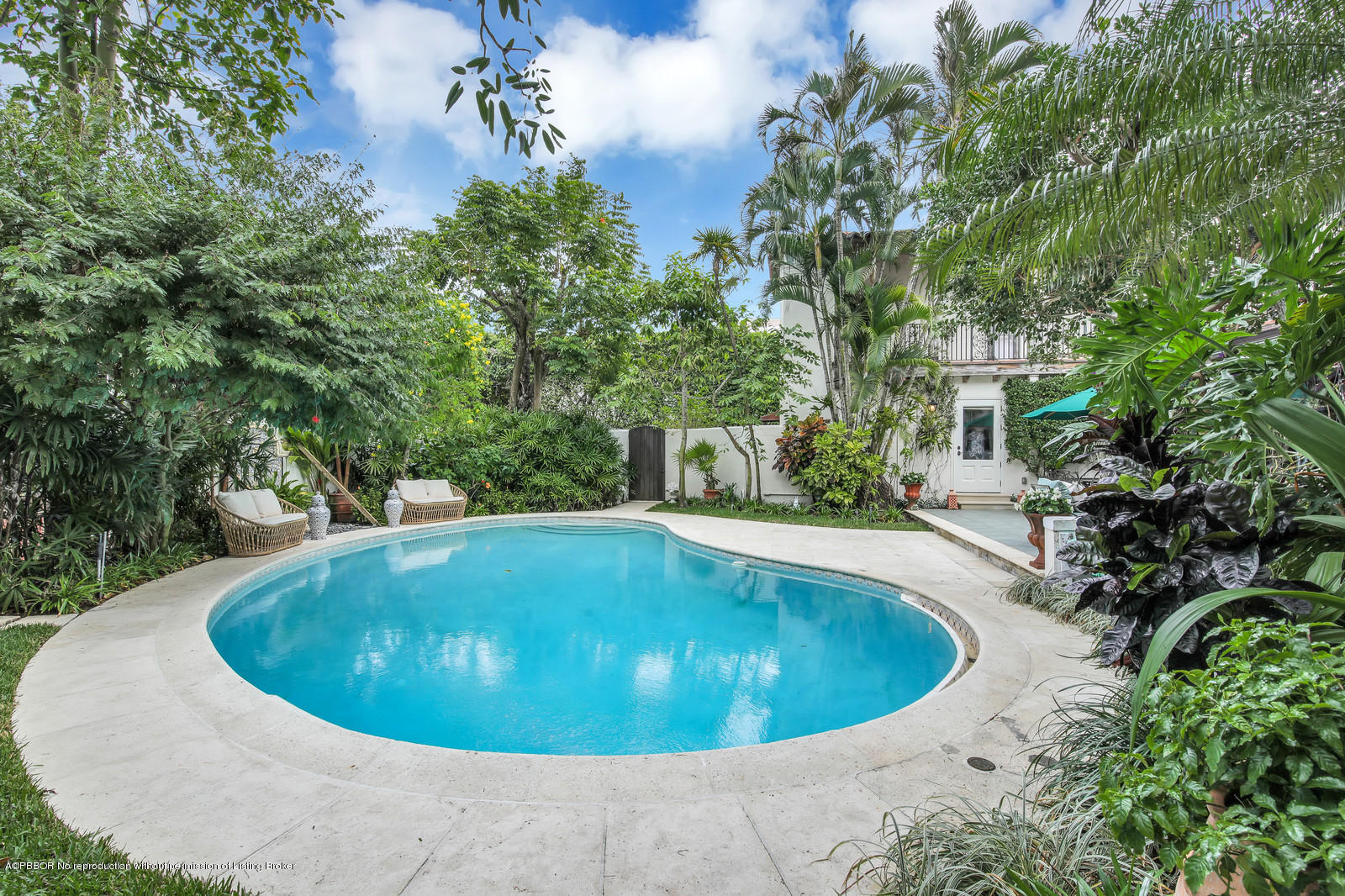 271 El Vedado Road Palm Beach, FL 33480 - Photo 31 of 32 a view of a swimming pool with a yard