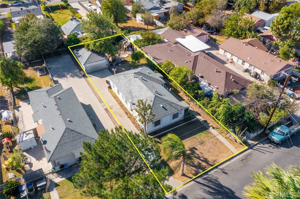 3950-3952 Everest Avenue Riverside, CA 92503 - Photo 1 of 1 an aerial view of a house with a garden