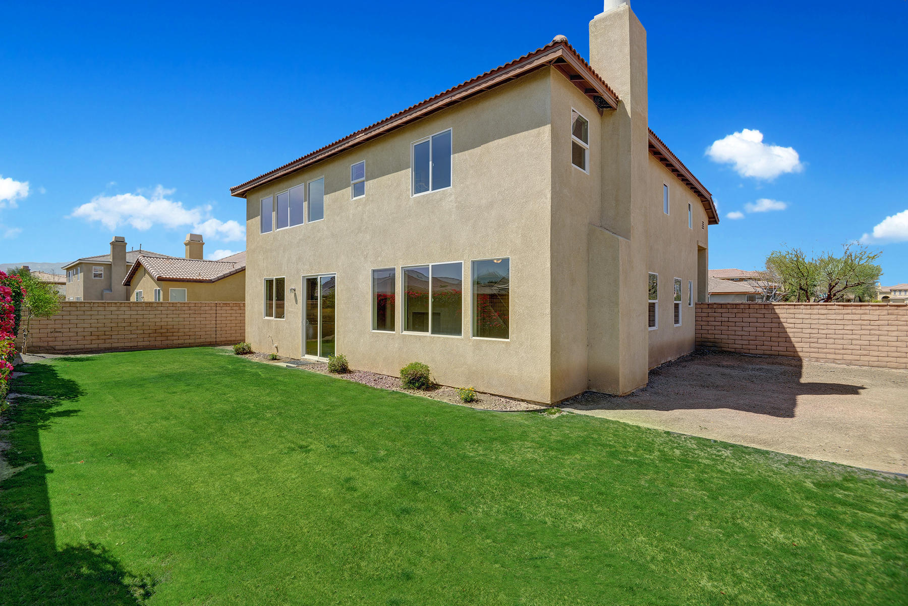 37348 Blackburn Road Indio, CA 92203 - Photo 2 of 30 a front view of a house with a yard