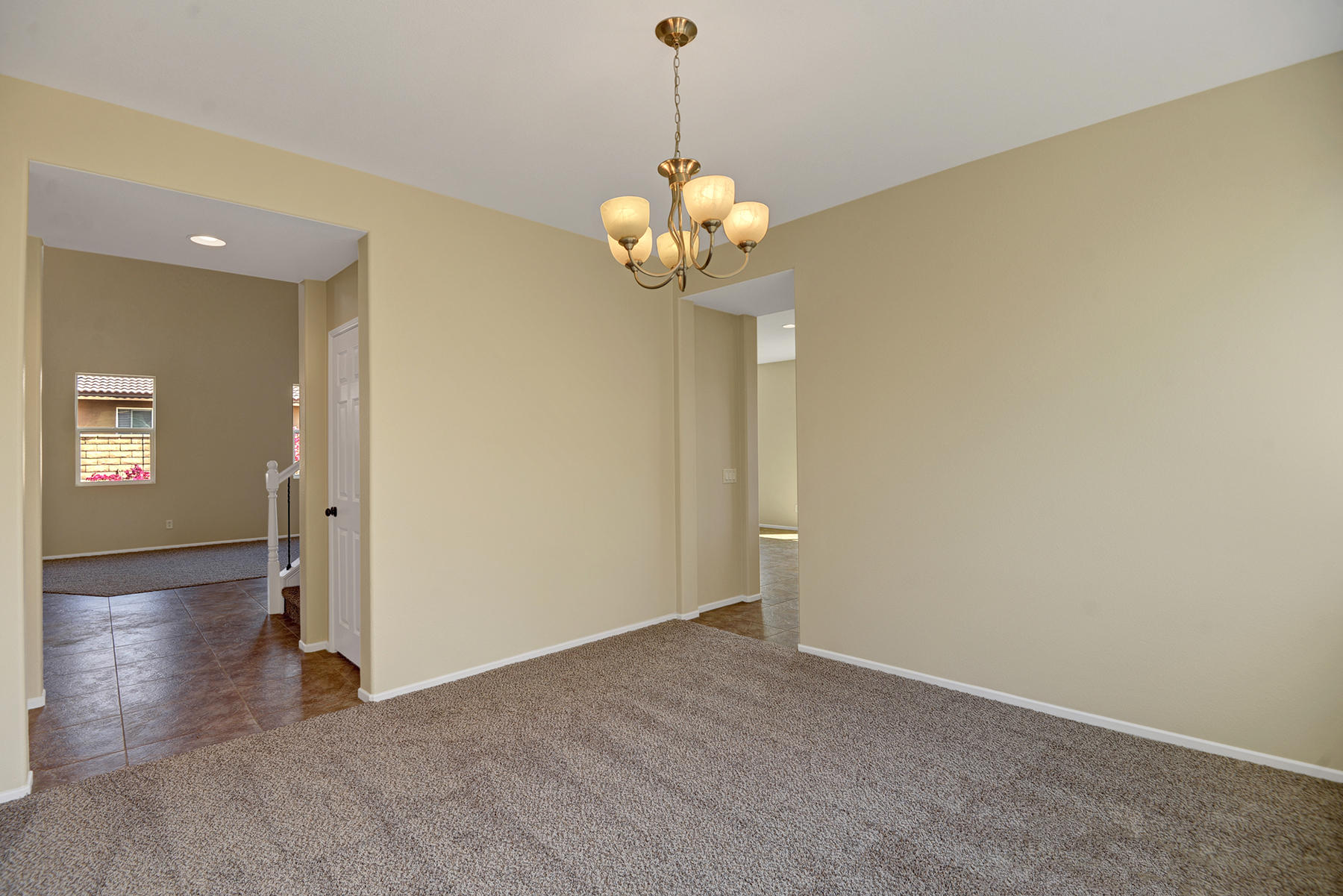 37348 Blackburn Road Indio, CA 92203 - Photo 12 of 30 a view of a chandelier in big room and chandelier