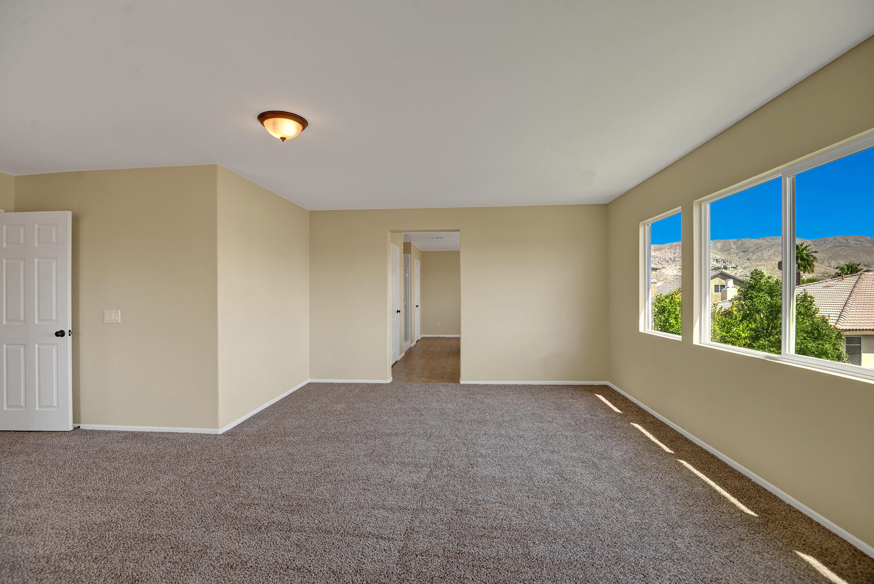 37348 Blackburn Road Indio, CA 92203 - Photo 19 of 30 a view of an empty room with a window