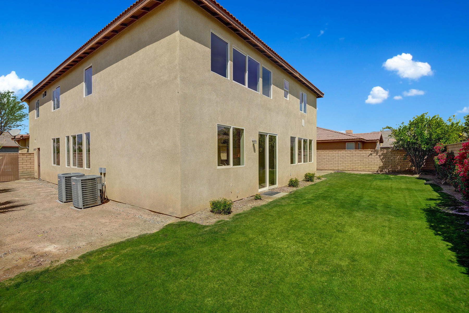 37348 Blackburn Road Indio, CA 92203 - Photo 3 of 30 a view of an house with backyard and garden