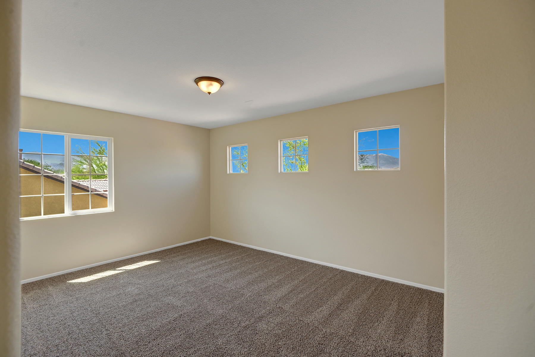 37348 Blackburn Road Indio, CA 92203 - Photo 25 of 30 a view of an empty room with a window