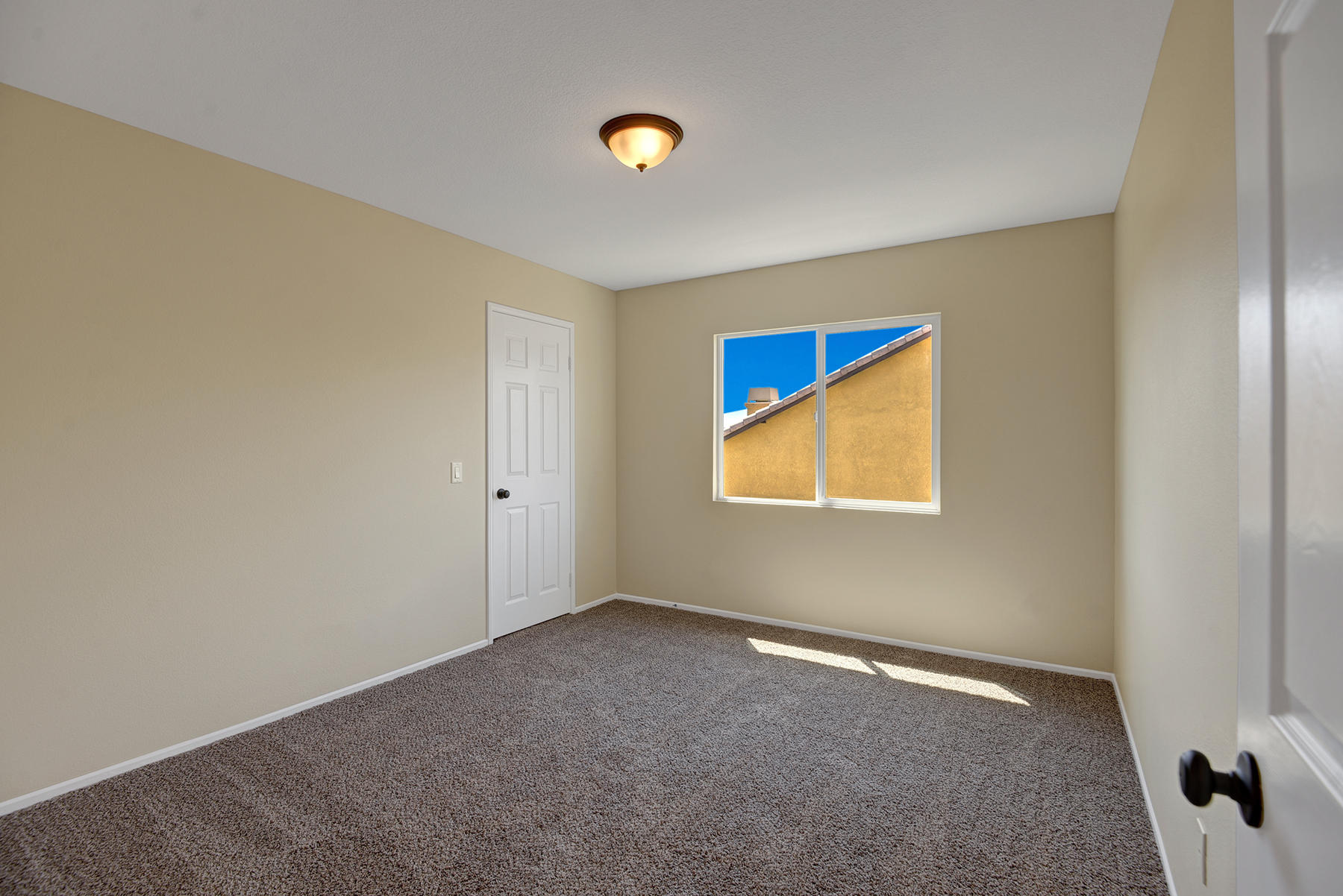 37348 Blackburn Road Indio, CA 92203 - Photo 28 of 30 a view of an empty room with a window
